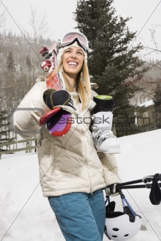 Woman with ski gear.