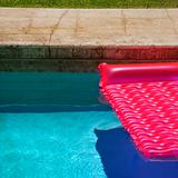 Pink float in  pool.