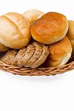 basket full of fresh rolls and bread