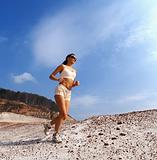 girl runs on sand