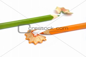 Sharp Pencils - Orange and Green isolated on white background, s