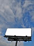 Billboard under blue sky with clouds