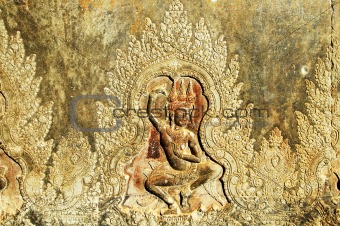 Sculpted wall at corridor of Angkor Wat, Cambodia