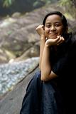 Happy smiling asian malay teen outdoors