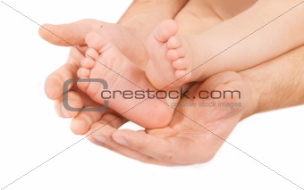 man's hand and children's foot