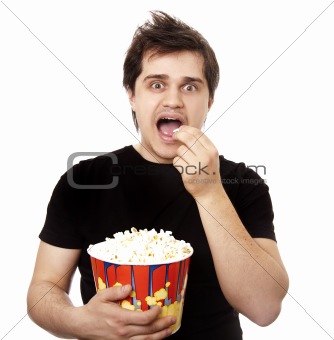 Funny men eating popcorn. 