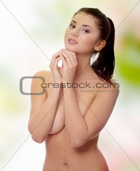 Portrait of the attractive topless girl 