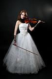 Girl in white dress with violin
