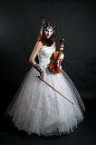 Girl in white dress and mask with violin