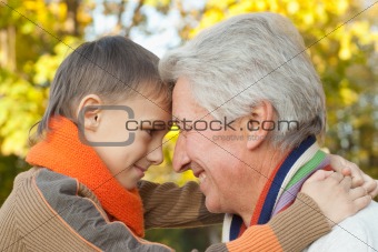 grandfather keeps his grandson 