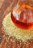 sesame seeds and sesame oil in a bottle