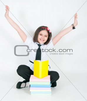 The joyful girl and textbooks