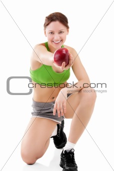 woman in sportswear with apple
