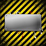 Metal plate on grunge background 