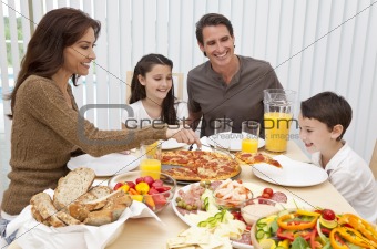 Parents Children Family Eating Pizza & Salad At Dining Table 
