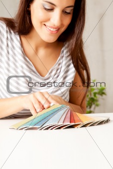 Woman looking at Color Swatches