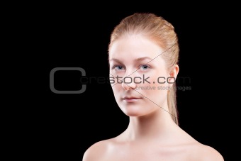 Portrait of a young lady on black
