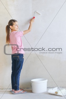 Girl Painting A Wall
