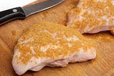 Chicken meat on a chopping board