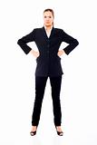 businesswoman standing with arms akimbo