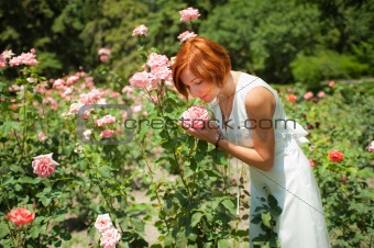 woman in roses garden