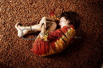 girl sleeping on a hazelnuts