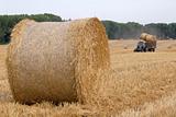 Rolls of straw and tractor