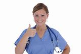 A female nurse with a friendly smile displaying the thumb up sign.