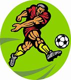 Soccer player kicking the ball 