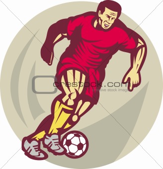 Soccer player running and kicking the ball 