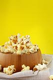 classic popcorn  in a wooden cup