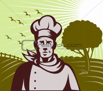 Organic Baker chef or cook with farm in background