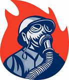 Fireman or firefighter wearing vintage gas mask