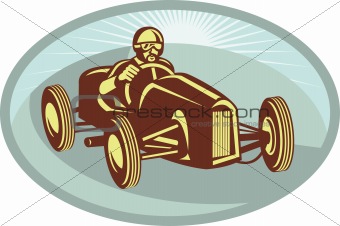 Vintage Race car driver racing with sunburst
