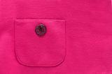 Pocket on pink textile