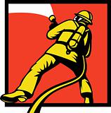 Firefighter or fireman aiming a fire hose 