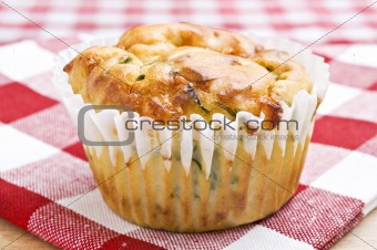 Freshly baked spinach and cheese muffins ready to be served