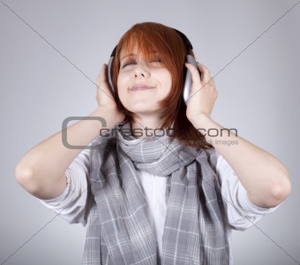Girl with modern headphones. 