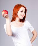 Girl with red apple in hand