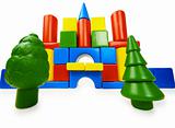 Toy colored castle and plastic trees