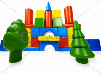 Toy colored castle and plastic trees