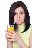 Woman with a glass of oranges juice