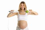 pregnant woman with a blender and apple