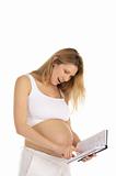 pregnant woman reading a book