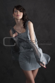 girl on black in light blue dress