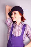 Beautiful girl in violet coverall 