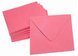 Stack of Pink Invitation Envelopes