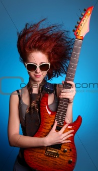 Fashion girl with guitar 
