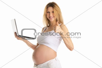 Happy pregnant woman with laptop