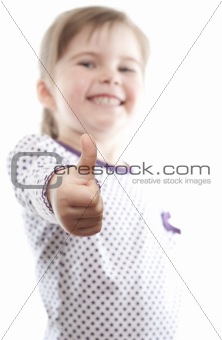 little girl showing thumb up